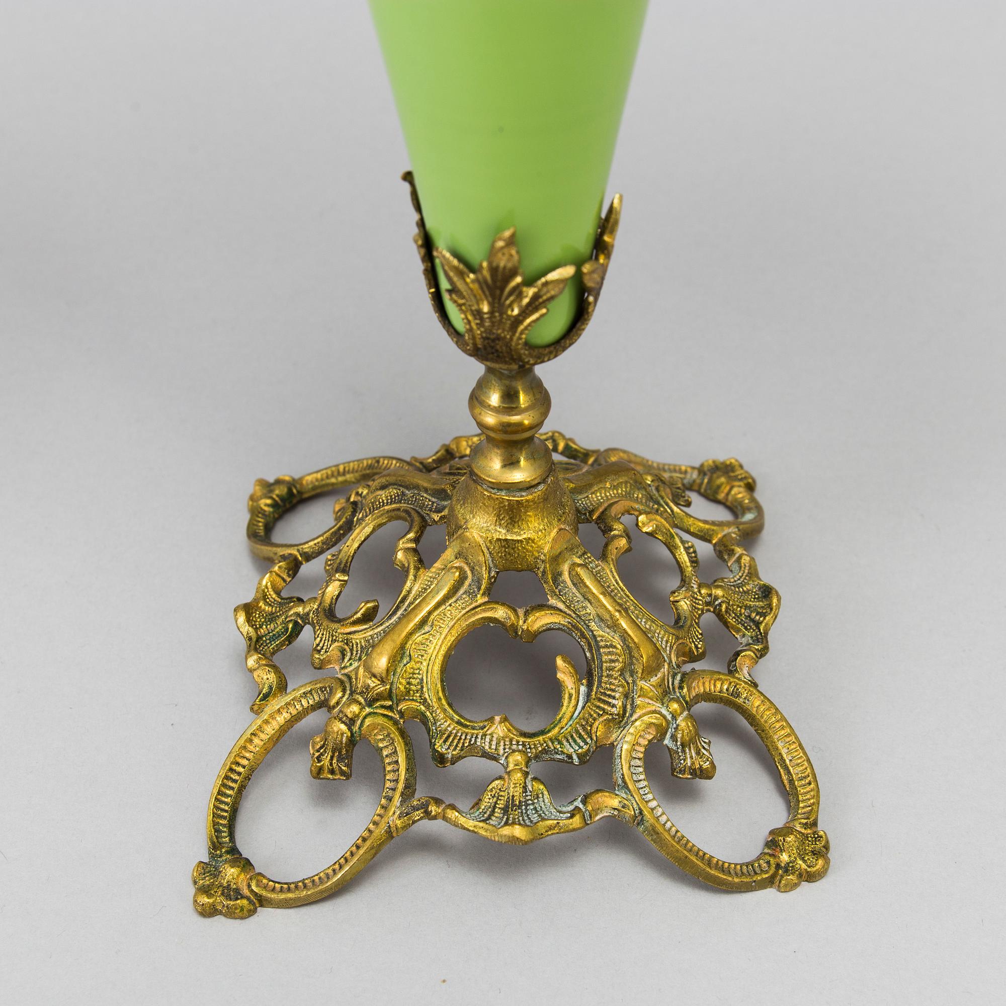 A pair of late 19th Century gilt candelabra.