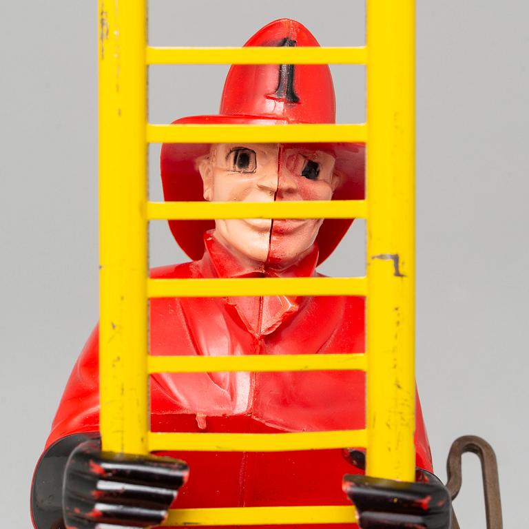 A tinplate Marx toys "The Climbing Fireman", 1950/60s.