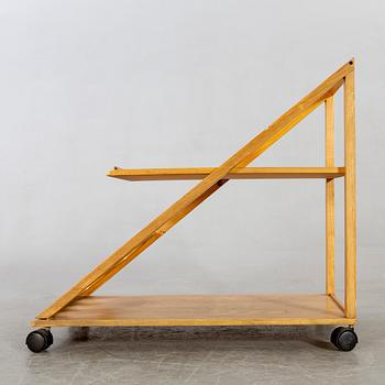 An Italian oak trolley later part of the 20th century.