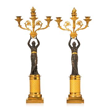 A pair of French Empire four-light candelabra, attributed to Francois Rabiat (bronze maker in Paris 1756-1815).