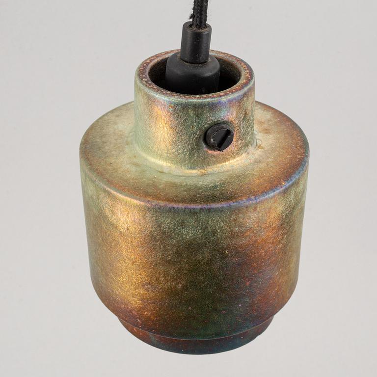 Tom Dixon, a set of three stoneware “Lustre pendants”.