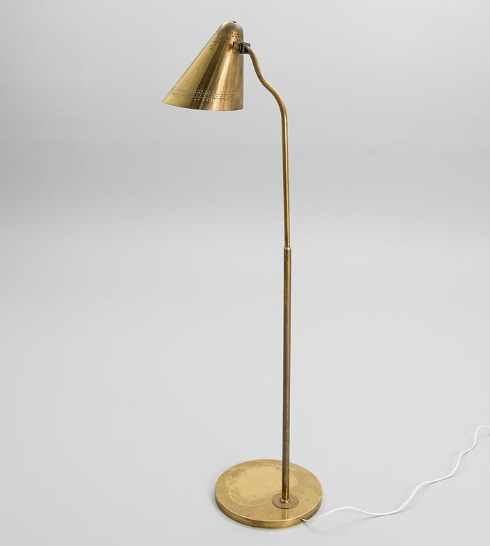 PAAVO TYNELL, A FLOOR LAMP. Domus Academica. Manufactured by Taito, 1947.