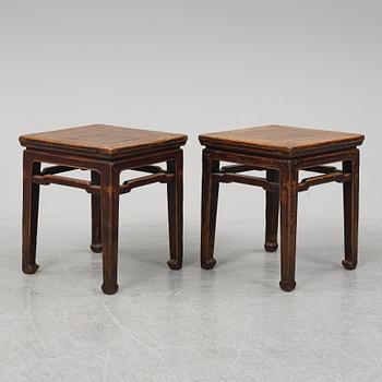 A pair of hardwood tables, 20th century.