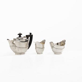 Thomas Hayes, a silver teapot, cream jug and sugar bowl, Birmingham 1897.