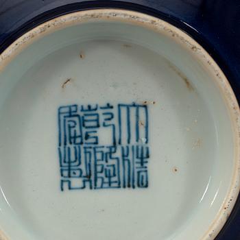 A blue glazed bowl, late Qing dynasty with Qianlong mark.