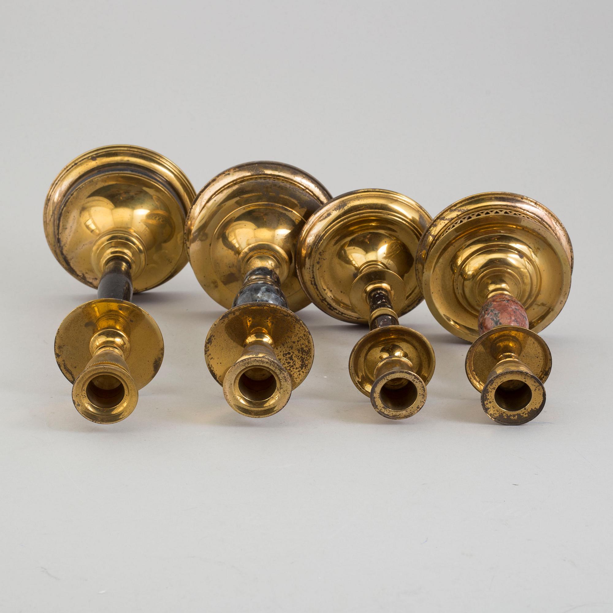 CARL HJALMAR NORRSTRÖM, four brass and stone candlesticks from Skultuna, numbered 073/300, 1997.