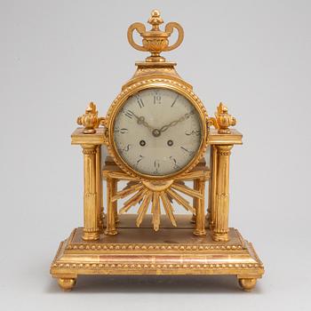 A Gustavian style mantle clock, signed C.A. Carlsson 12/12 1913 Nyköping.