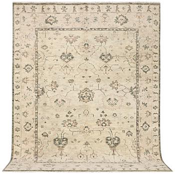 An oriental carpet with Mamluk-design, c. 360 x 280 cm.