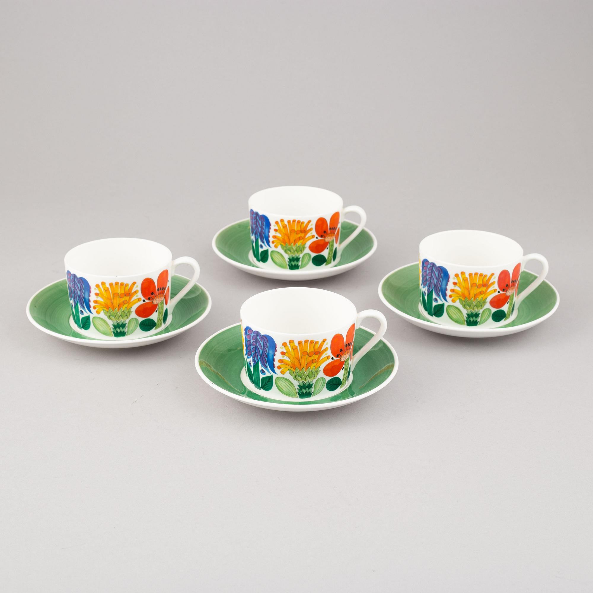 A set of four 'Tahiti' tea cups with plates by Stig Lindberg for Gustavsberg.