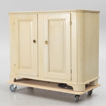 A Gustavian cupboard, early 19th century.