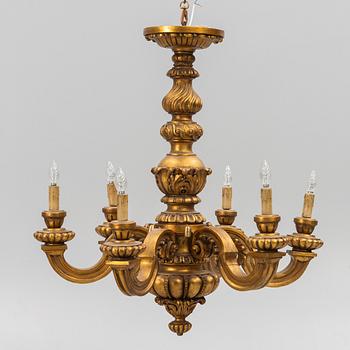 A baroque style chandelier, around 1900.