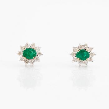Emerald and brilliant cut diamond earrings.