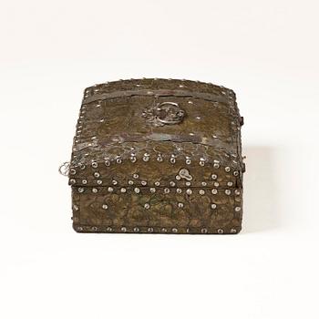 A presumably German baroque repoussé brass writing box, late 17th century.