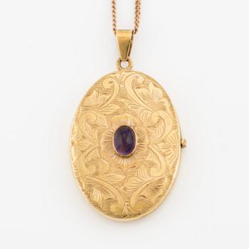 Medallion/pendant in 18K gold with an amethyst.