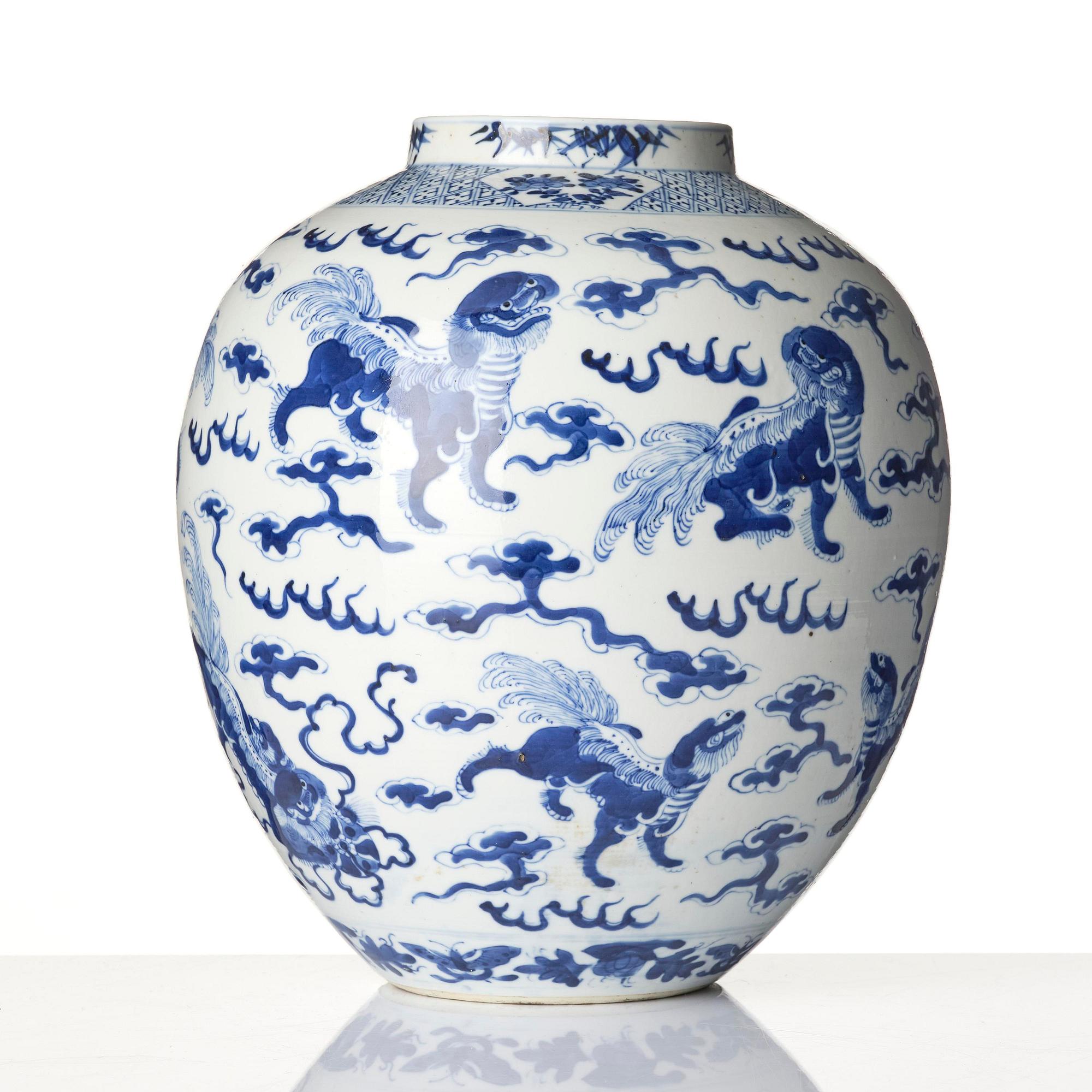 A blue and white 'buddhist' lion jar, Qing dynasty, 19th century.