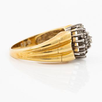 18K gold ring with diamonds.
