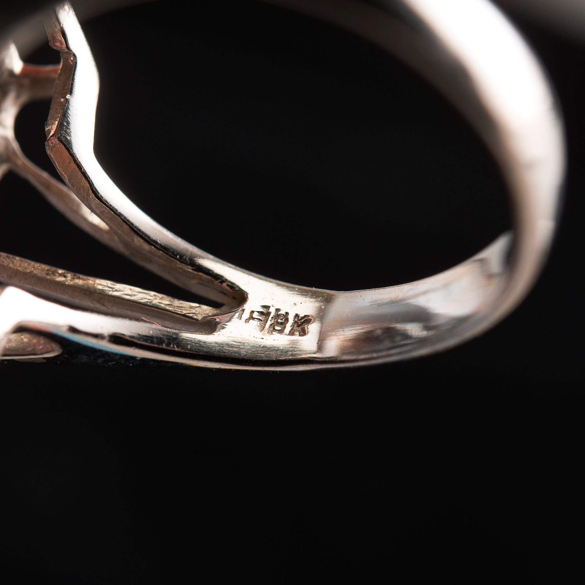 A RING, topaz c. 3.70 ct, brilliant cut diamonds 0.56 ct. 18K white gold. Size 17,5, weight 6,6 g.