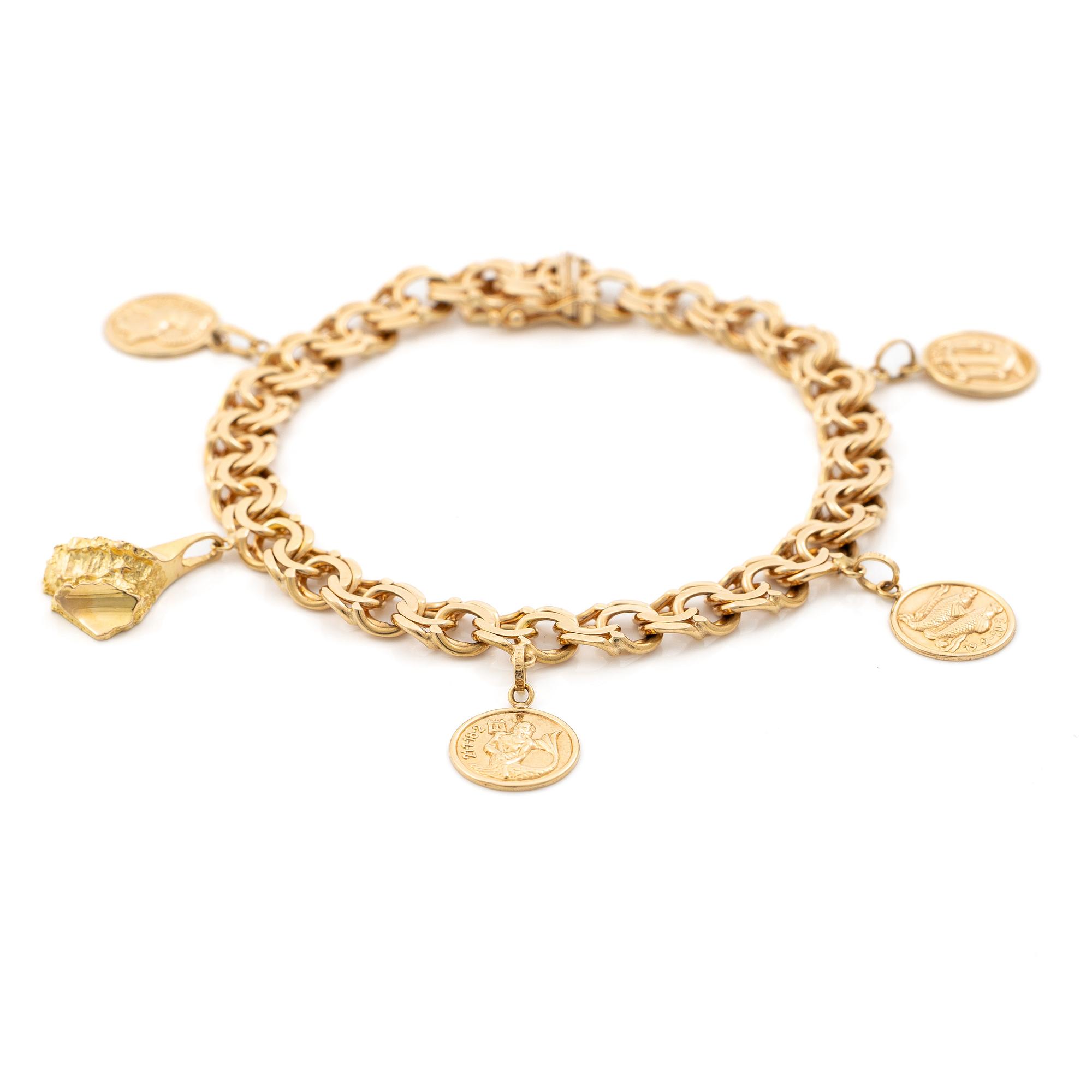 Bracelet, 18K gold, with charms including zodiac signs.