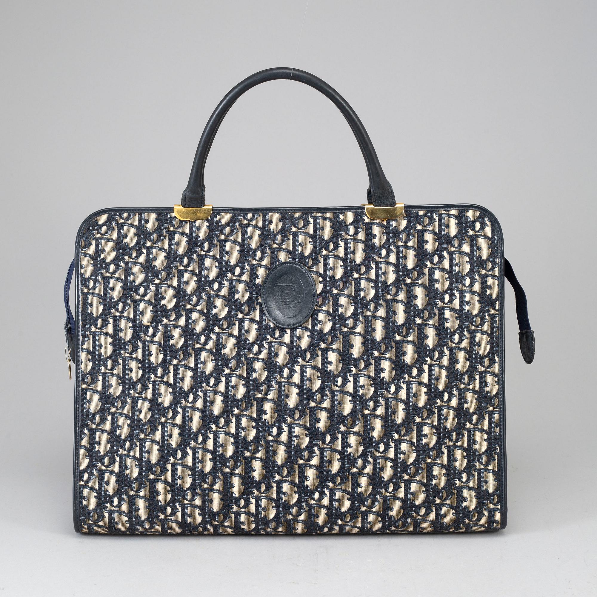 CHRISTIAN DIOR, a canvas bag.