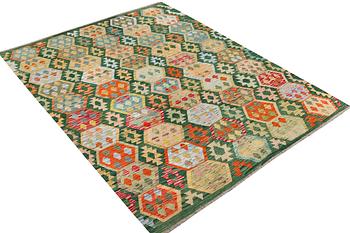 A Kilim carpet, c. 238 x 184 cm.