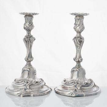 Four Swedish Rococo silver candlesticks, mark of Arvid Floberg, Stockholm 1768 and 1779.