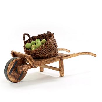 Ingrid Herrlin, a stoneware basket with 30 apples and a wheelbarrow, Sweden ca 1988.