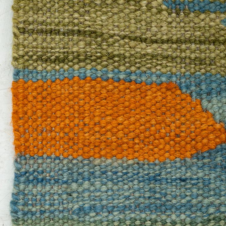 A kilim rug, 247 x 170 cm.