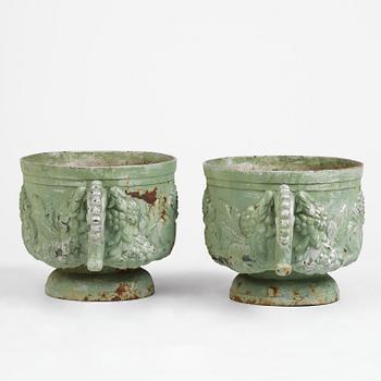 A pair of Swedish cast-iron garden urns, presumably later part 19th century.