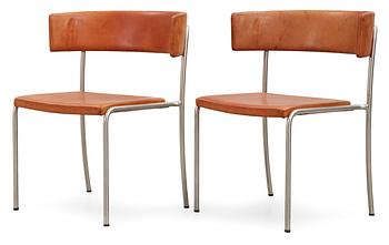 17. A pair of Erik Karlström steel and brown leather chairs,Stockholm ca 1965.