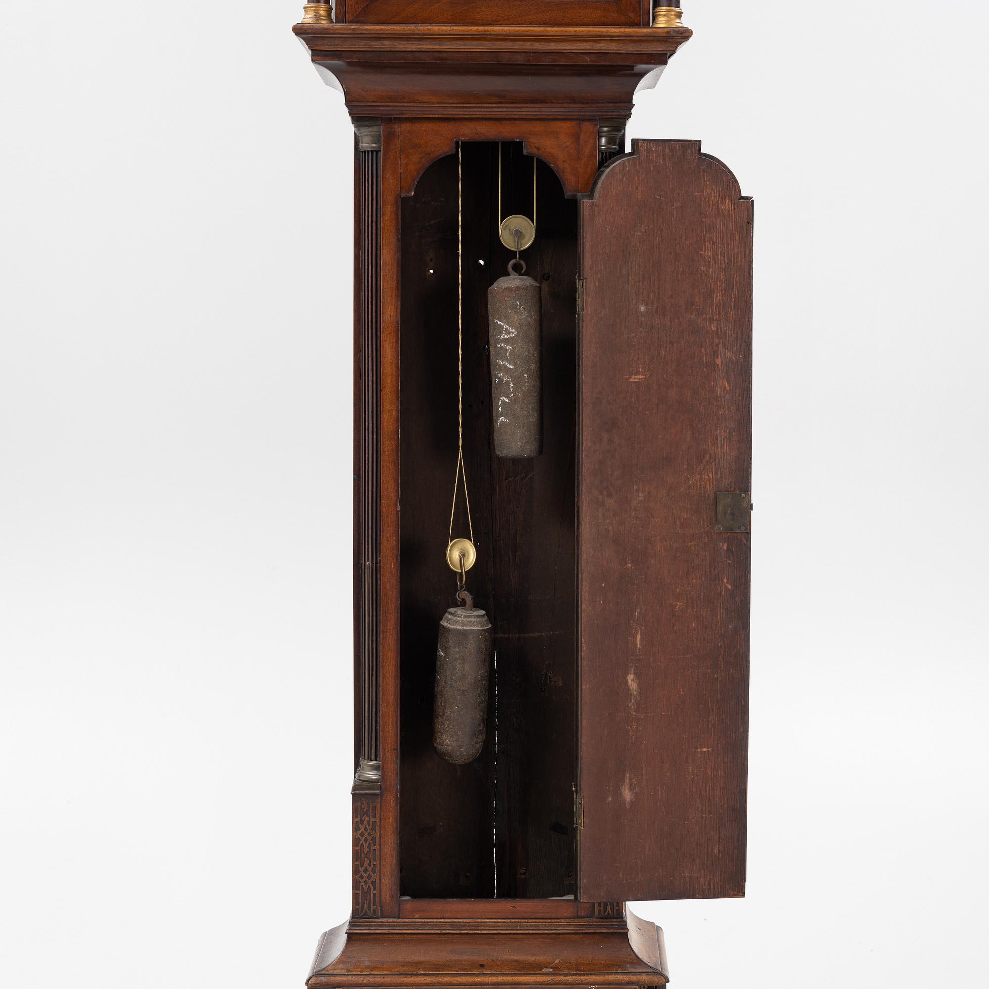 A mahogany veneered longcase clock, marked Peter Pohlmann, London, England, 18th century.