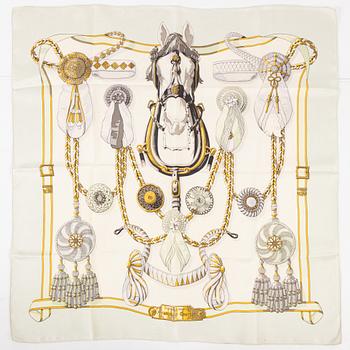 Hermès, a 'Frontaux et Cocardes' silk scarf.