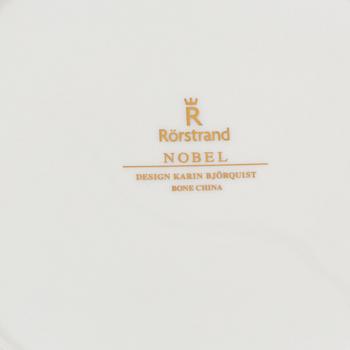 Karin Björquist, tallrikar, 18 st, porslin, "Nobel", Rörstrand.