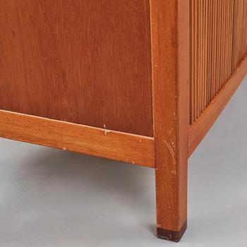 David Rosén, a mahogany and teak cabinet, for Stockholm's Association of Crafts, signed and dated 1959.