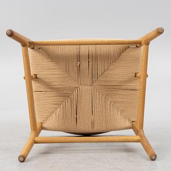 Hans J. Wegner, a CH26 chair, Carl Hansen & Son, Denmark, 21st century.