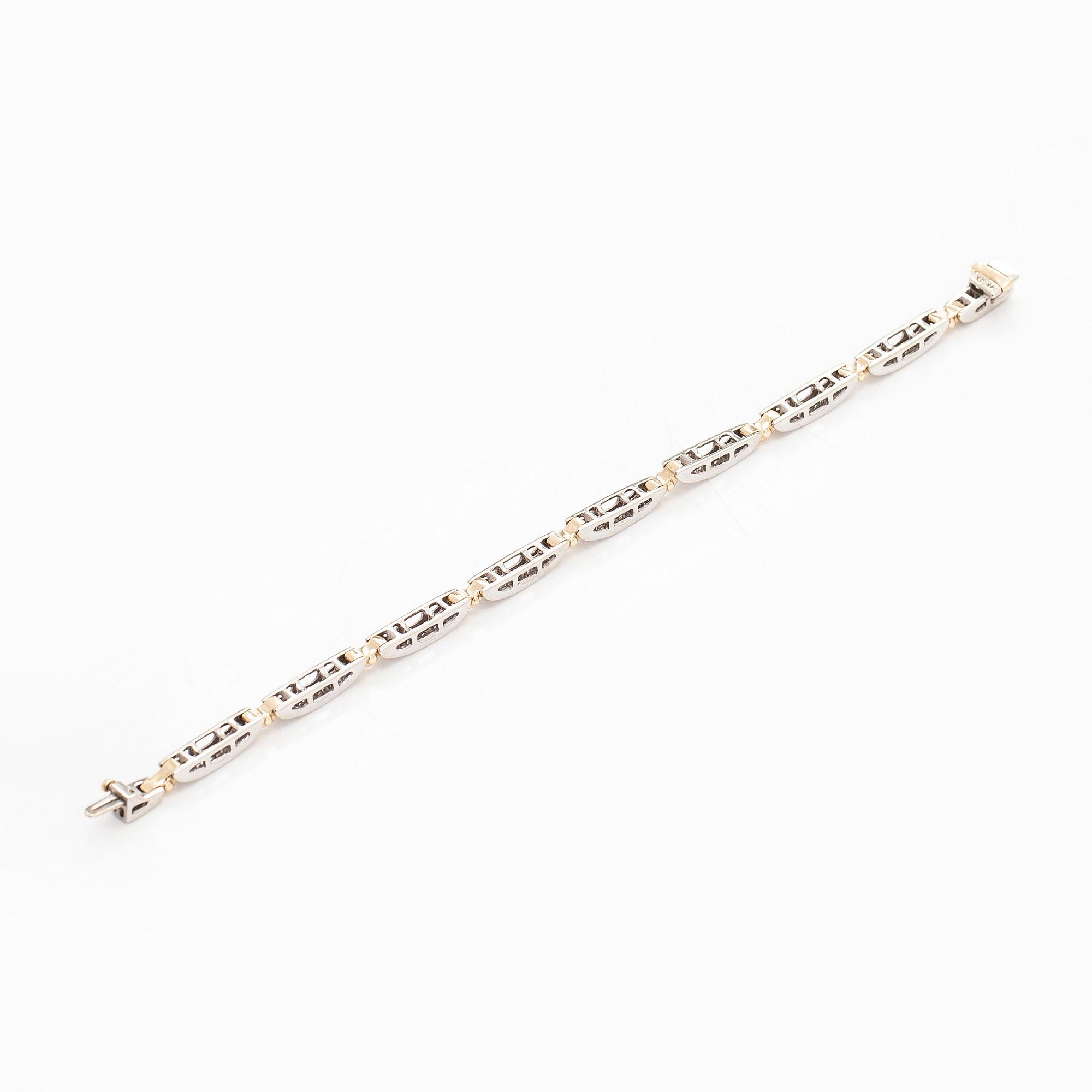 Rannekoru, 14K kultaa/valkokultaa prinsess- ja baguettehiottuja timantteja.