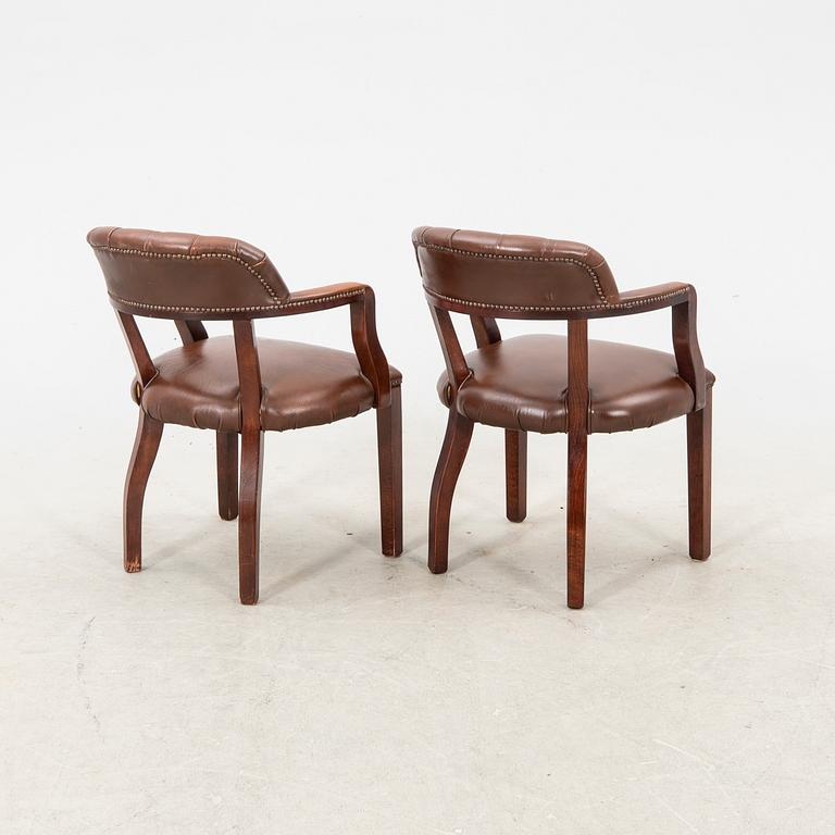 A pair of leather armchairs from the second half of the 20th century.
