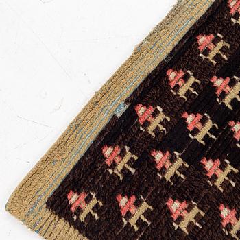 A knotted pile rug, Sweden/Finland, 18th/19th Century, c. 190 x 158 cm.