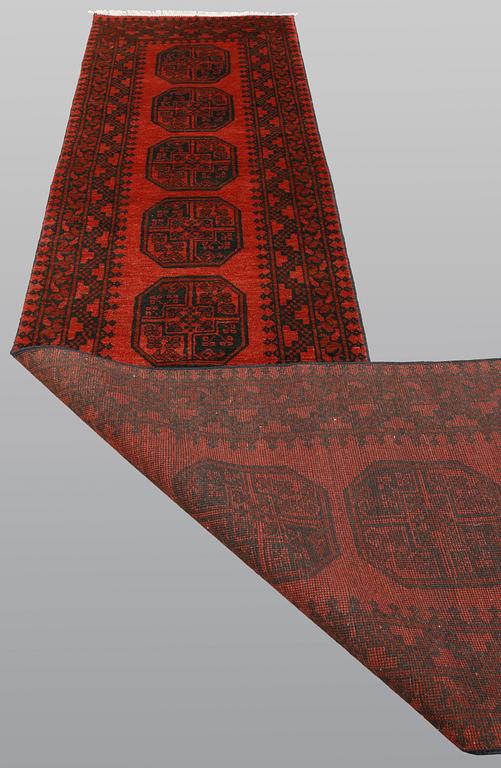 An Afghan runner, ca 383 x 78 cm.