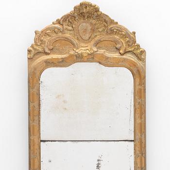 A Swedish rococo giltwood mirror, later part 18th century.