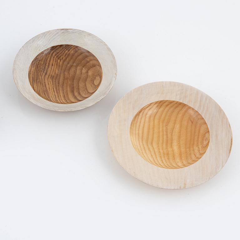 Magnus Ek, a set of seven ash wood plates for Oaxen Krog, 2020.