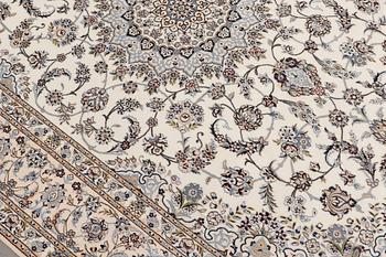 A carpet, Nain part silk s.k 6LAA, ca 310 X 209 cm.