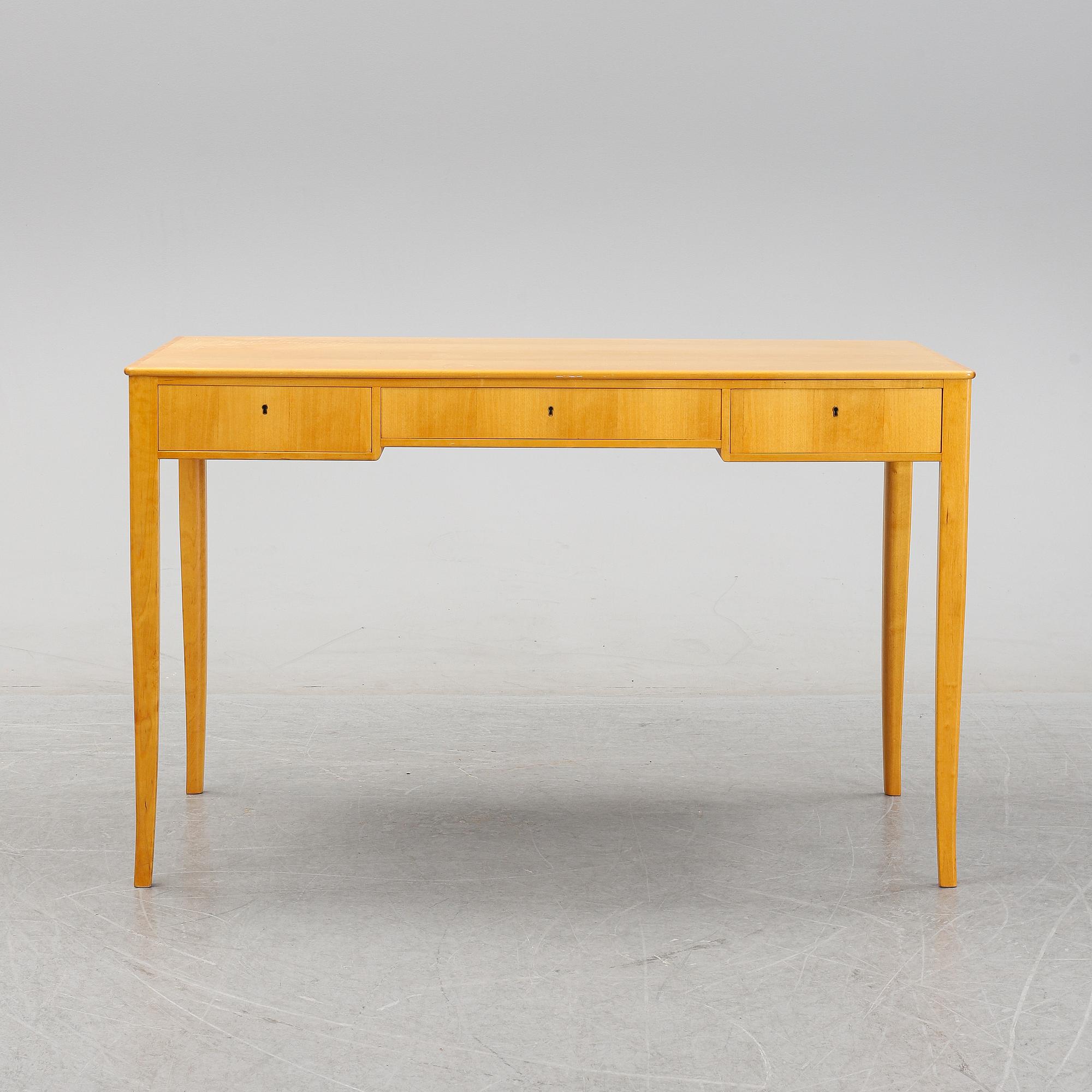 A 'Nya guldheden' desk by Carl Malmsten.