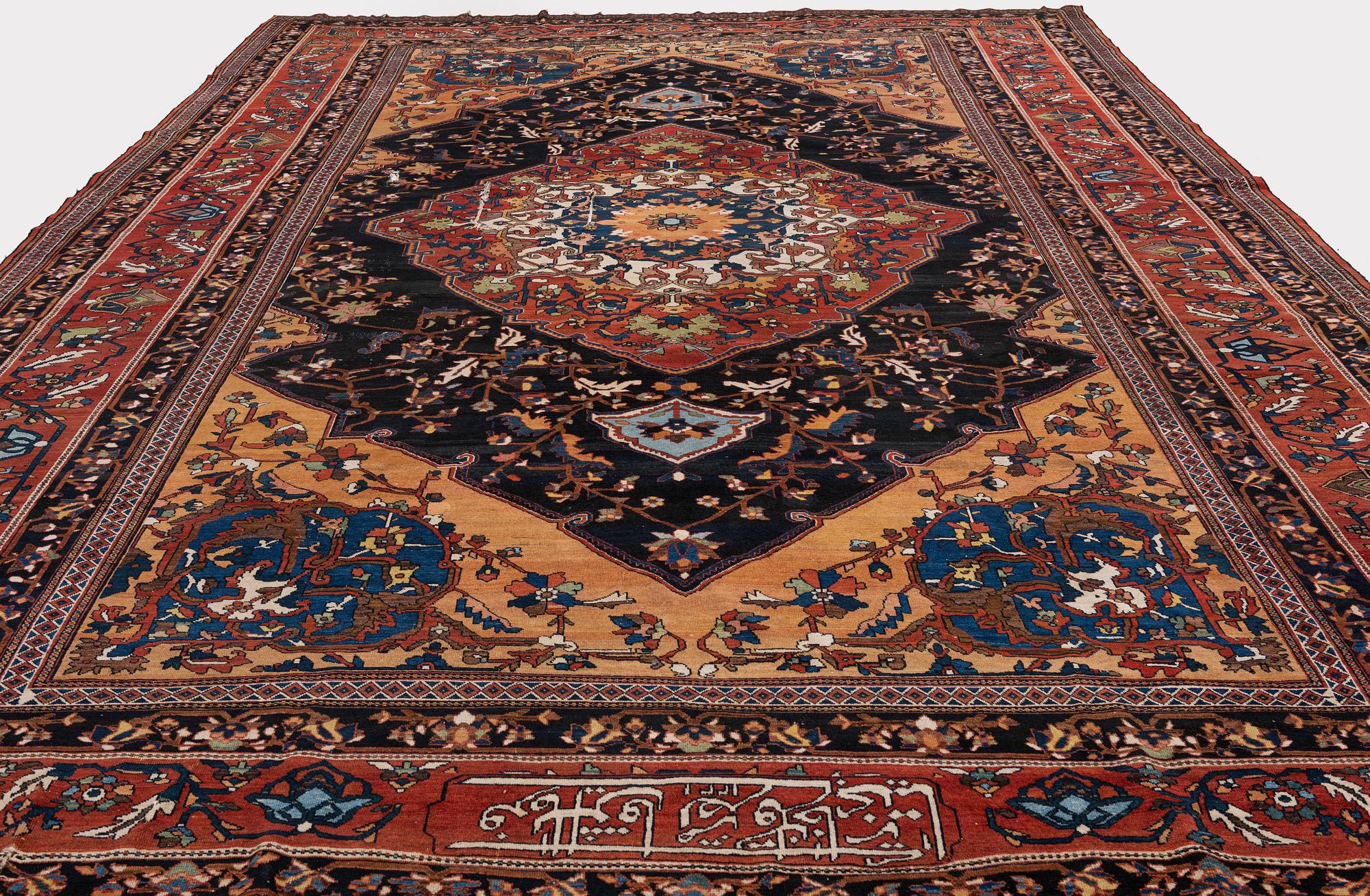 An antique 'khan carpet', Bakhtiari, western persia. c. 550 x 350 cm.