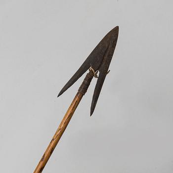 A 19th/20th century south-east asian bow with an arrow.