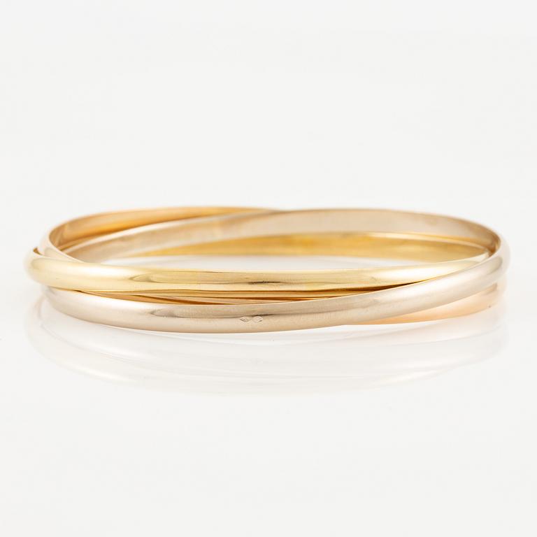 A Cartier bracelet "Trinity" 18K gold in three colours.