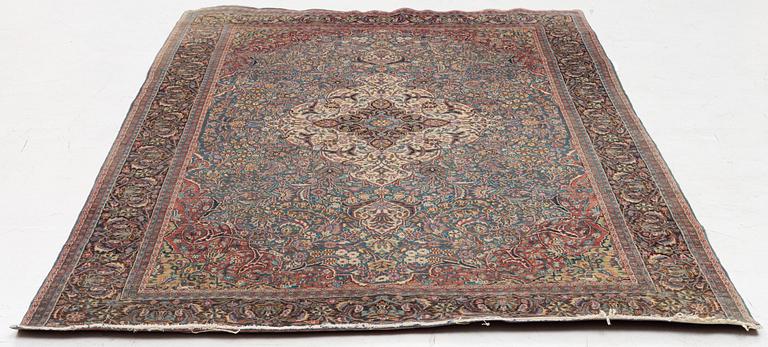 A semi-antique Khorasan rug, east Persia, c. 242 x 140 cm.