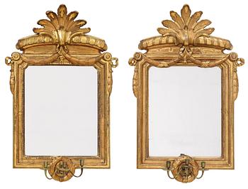 A matched pair of Gustavian three-light girandole mirrors, by N. Sundström.