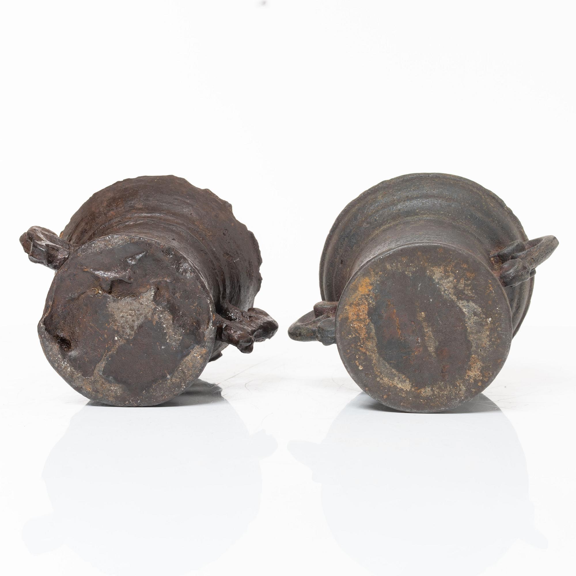 A set of two renaissance-type cast-iron mortars, 17th century.