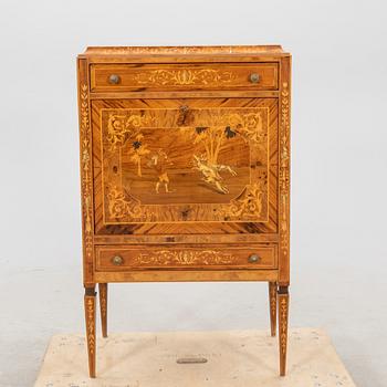 A mid 1900s European bar cabinet.