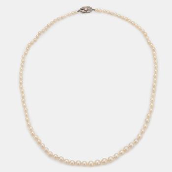 918. A WA Bolin cultured pearl necklace with an 18K white gold clasp set with a pink diamond.